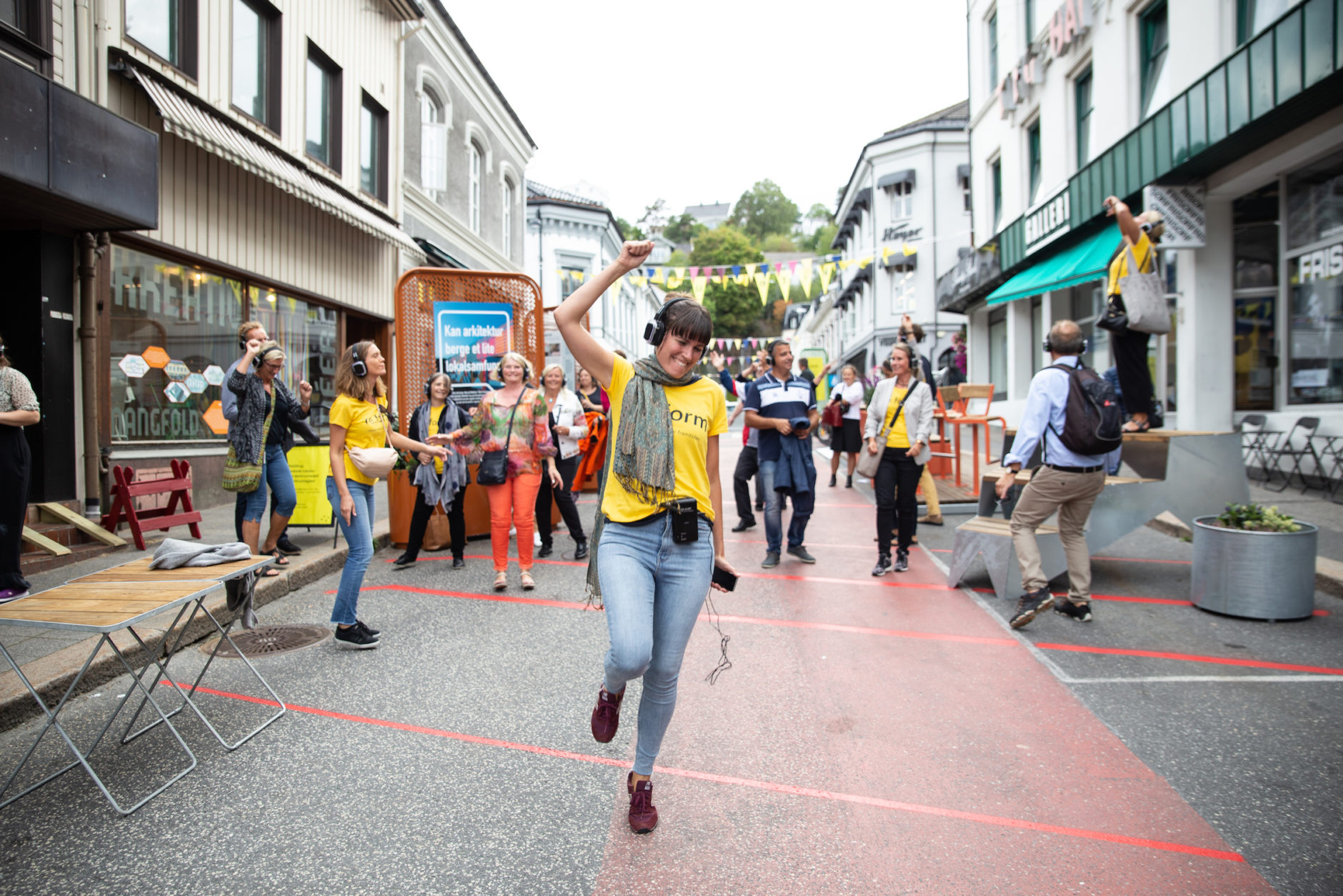 Experiencing a performative audio walk at Arendalsuka, Norway, based on your choice of urban future, part of OAT's events testing ideas and formats, 2018, ahead of the 2019 Triennale. © Arendalsuka/Mona Hauglid.