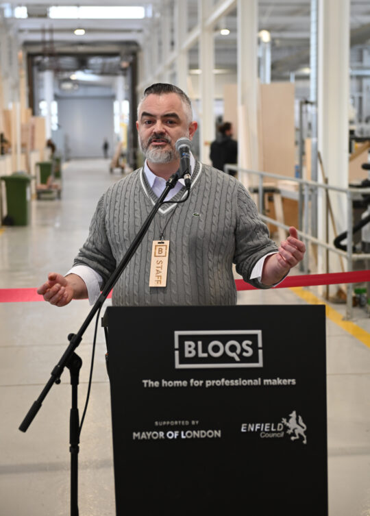 Al Parra, one of Building Bloqs' co-founders and directors, speaking at the launch of Bloqs' new open access factory, Meridian Water, 10 February 2022. Photo: Stuart Wilson for Getty.